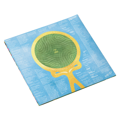 Stylized yellow magnifying glass with a green circular lens on a blue background.